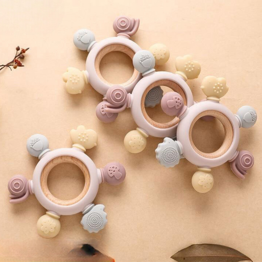 Baby teething toy made of wood and silicone
