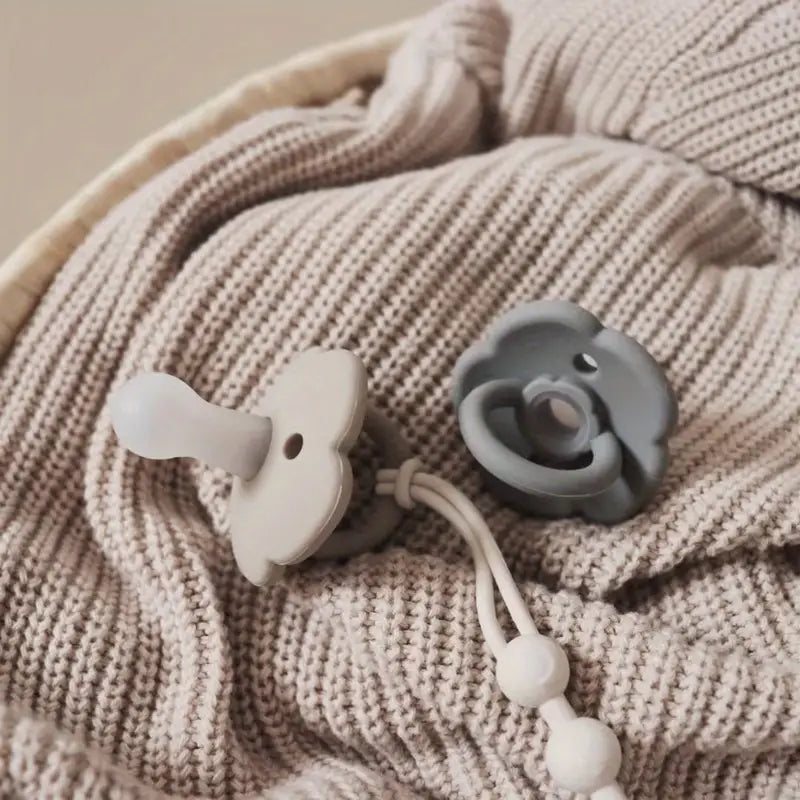 TuttiTidy™ – Der minimalistische Schnullerhalter