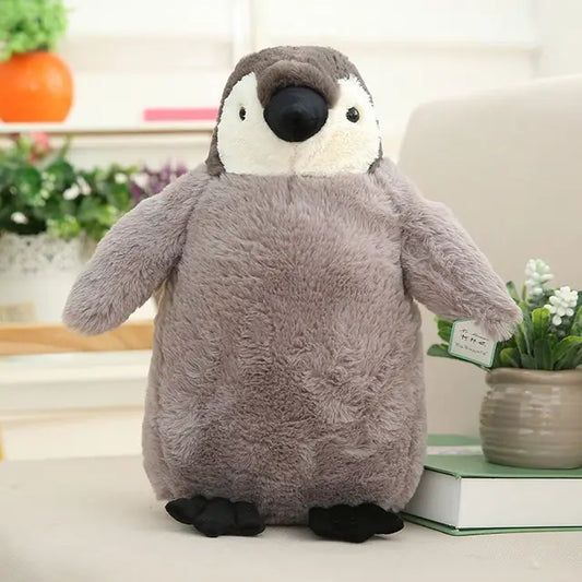 SnuggleWaddles™ – Der kuschelige Pinguin voller Fantasie