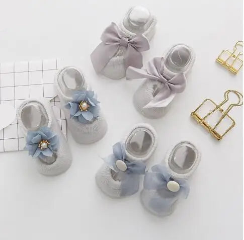 AngelToes™ – Eleganti & Komfortabli Babysöckli mit Antirutsch