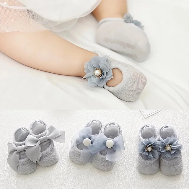 AngelToes™ – Eleganti & Komfortabli Babysöckli mit Antirutsch