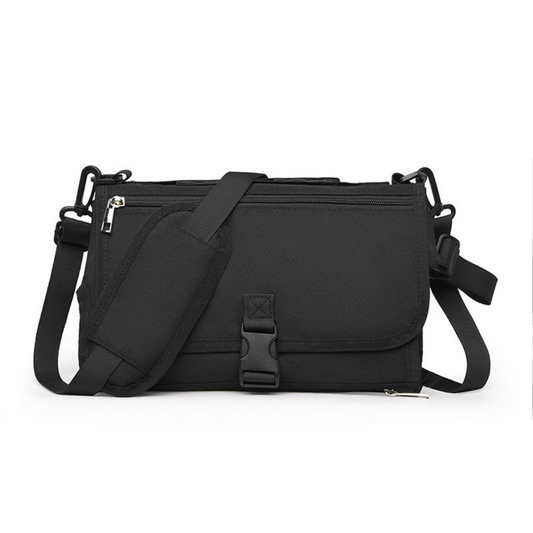 Kompakte Wickelunterlage mit Taschen für unterwegs